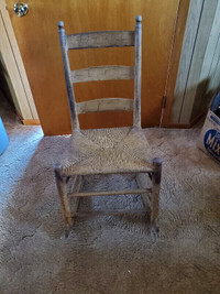 Antique ladder back rocking chair