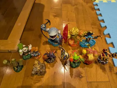 Dive into adventure with this lot of Skylanders figures! These toys are used but in good condition,...
