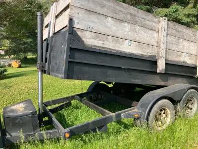 5 ton dump trailer 6x12 Front hoist Tandom axle brakes on both axles Curtis trailer built in kaladar
