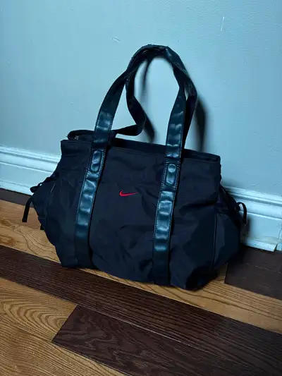 Crazy rare bag! Incredible design! Magnetic and zipper closure! Many pockets! Super clean inside and...