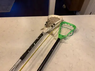 2 lacrosse sticks , View more