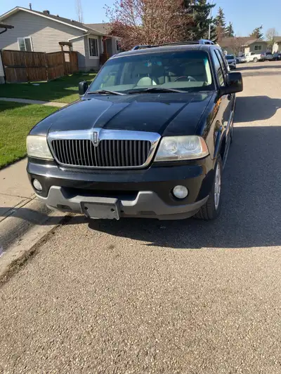 2003 Lincoln Aviator. 273k. Super clean and quiet. No dents or dings. Three rows of seats, dvd playe...
