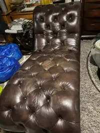 Beautiful brown leather and solid wood accent chair 