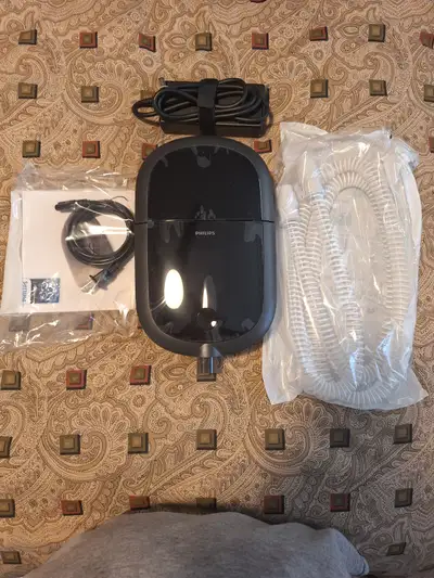 Dreamstation 2 Auto CPAP Advanced. Has never been used. Complete with hose and travel bag. No mask i...