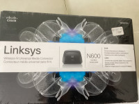 Linksys network connector to connect wired devices to wireless
