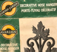 Cast iron decorative garden hose hanger