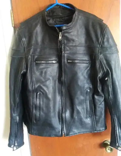 Men's motorcycle leather "skulls" jacket, fits like a smaller Large size, "as new", worn once, from...