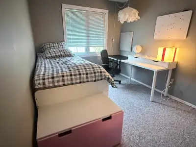 If you see this ad, room is available. A cozy bedroom in a family townhouse condo, for a: female int...