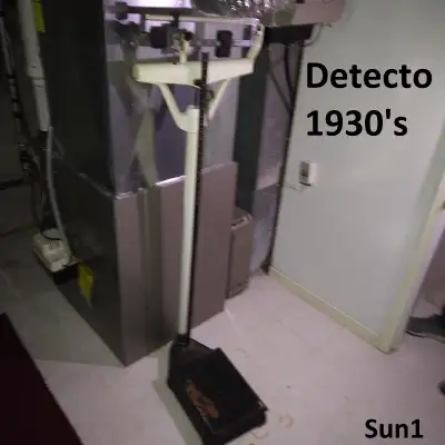 Authentic antique industrial medical floor scale in good working condition.