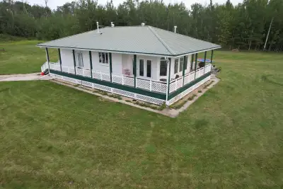 NEED SOLD. OPEN TO NEGOTIATIONS. Well-maintained 1,388 sq. ft. bungalow on 13.37 picturesque acres r...