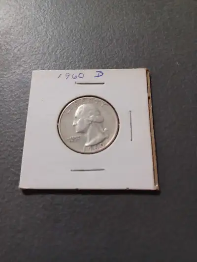 This is a 1960 D United States of America Quarter Dollar. Given the age, it is in fair condition, wh...
