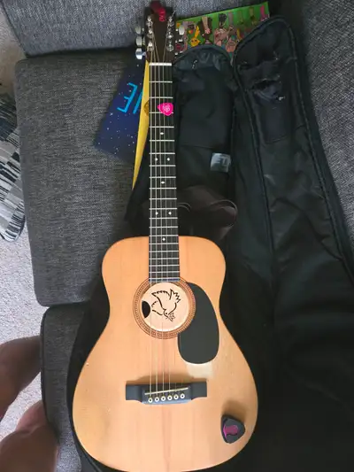 Can read all the specs and info here : https://www.long-mcquade.com/146896/Guitars/Acoustic-Guitars/...