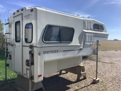 Northern Lite truck camper in gteat condition. All fiber glass exterior. Fits in my 1/2 ton short bo...