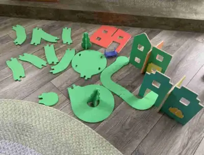 Lovevery Wooden Modular Village & Pathways Includes felt building road set, perfect for constructing...