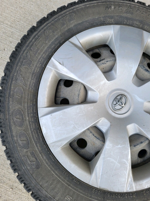 Goodyear nordic 215/60/16 winter tires on steel rims and covers Other Winnipeg Kijiji
