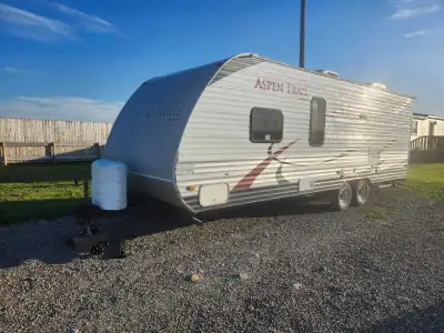 2012 Dutchman camping trailer, has hail damage but other than that good condition everything works a...