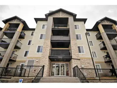 Bright and comfortable top-floor corner condo with 2 bedrooms, in-suite laundry, heated underground...