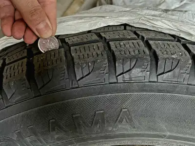 Yokohama ice guard winter tires on rims Tires stored in garage and are in great shape. Woman driver...