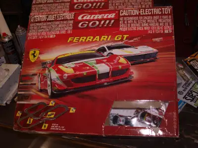 2 Carrera Go Ferrari GT tracks and one Carrera Go pursuit track .All as new only put together once t...