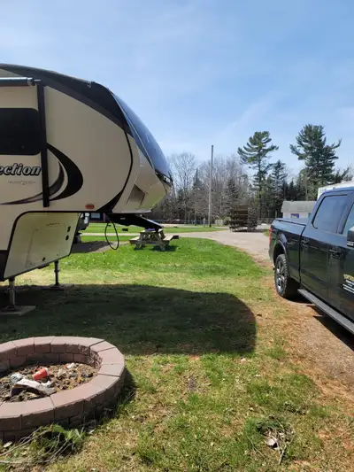 For Sale. Grand Design Reflection 311 BHS fifth wheel trailer located on a seasonal lot at the wonde...