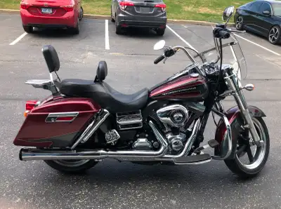I am selling my 2014 Dyna Switchback. This bike is shiny and comfortable and gets more attention tha...