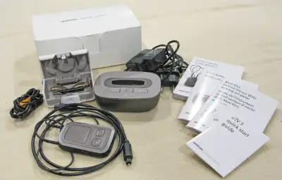 Unitron Moxi Kiss Hearing Aid Kit Everything you see. In great working order. You will need to have...