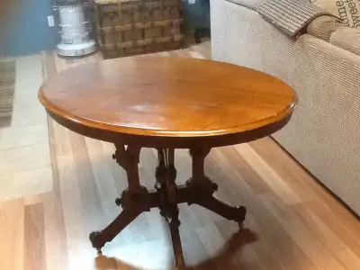 Beautiful antique Eastlake parlour table on caster wheels. Excellent condition, 41 inches x 30 inche...