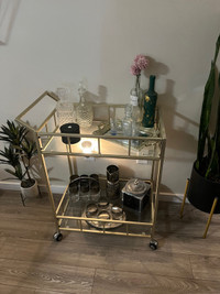 Bar cart with vintage glass wear