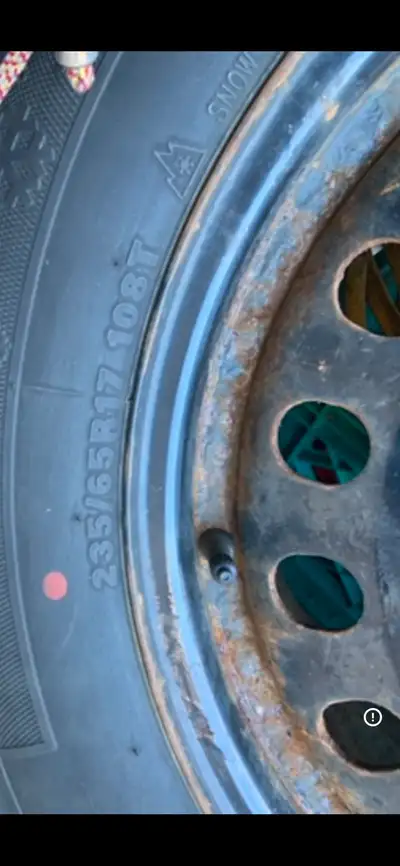 For sale is a single winter tire, size 235/65R17 108T, mounted on a steel rim. This tire is in used...
