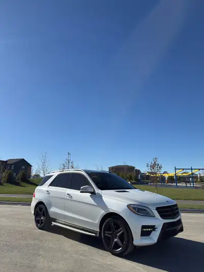 2014 Mercedes ML350 Bluetec active title, White exterior, Brown interior Well maintained, fully load...