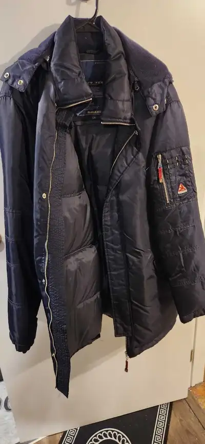 I'm selling a Point Zero Systems men's winter jacket, perfect for staying warm and stylish during th...