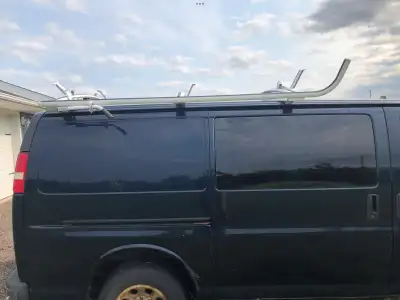 Fits most vans with gutters good condition