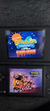 Nintendo DSi Game System with 4 kids gamesSponge Bob Square Pant