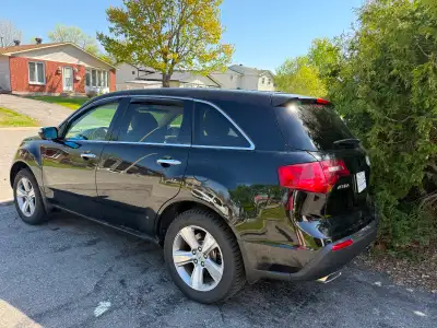 2011 MDX in pretty good shape. Has Bluetooth, back up camera, sunroof, 2 sets of tires, and winter m...