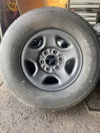 P235/75R16 tire on 6 bolt Chevy rim