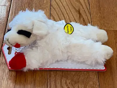 New …plush dog toy… squeeze/bite it and it squeaks…approximately 9 inches long Shipping available…pi...