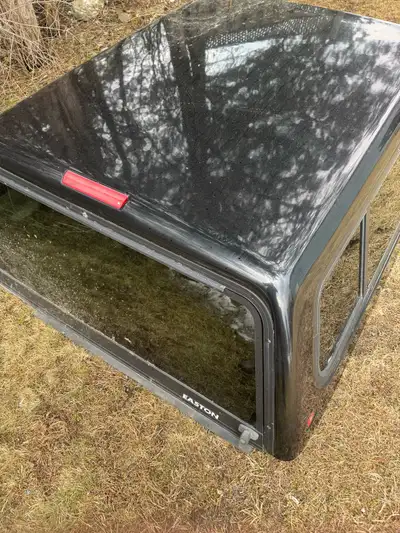 Black gm truck cap. 6 feet long off of a Chevy truck. 400 obo may trade for trailer or useful stuff.