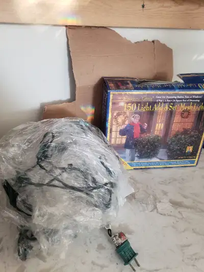 Outdoor netted Christmas lights for sale. I have 2 sets. Both new and never used. One has a box othe...