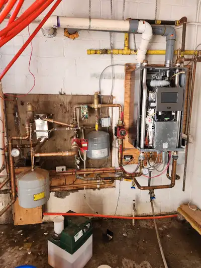 200,000 btu Trinity boiler. Only 6 years old. Was working perfectly when pulled out. Comes with all...