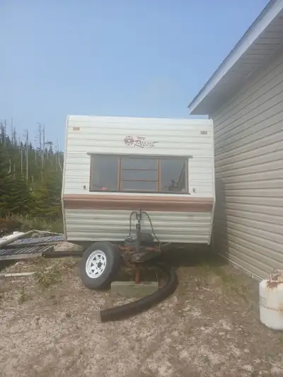 Free camper. Was planning to fix it up but lost interest. Ceiling is falling down Has water damage a...