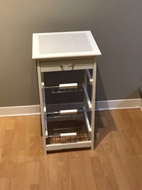 White stand with four drawers