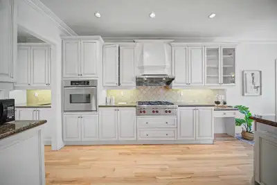 We are doing a home renovation and selling this high-end, clean, solid custom kitchen cabinet set. T...