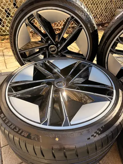Complete OEM 21” wheel & tire set from a 2022 Audi RS e-tron GT. Premium trapezoidal aero design in...