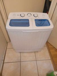 Portable washer with drying system. 