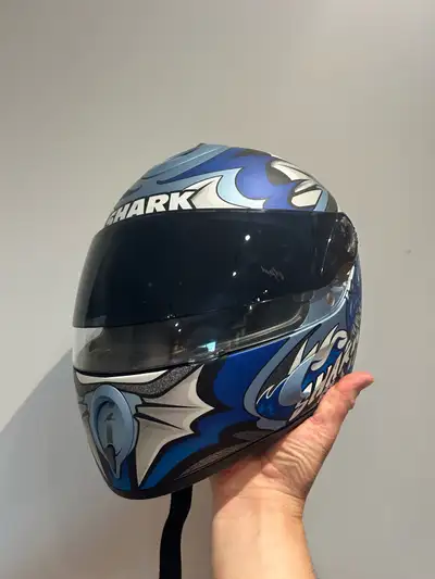 This is a used Shark RSR2 XL helmet, featuring a sleek blue dragon design, perfect for motorcycle en...