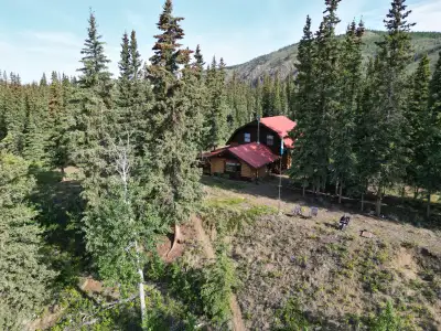 A rare, one of a kind wilderness gem. A beautifully hand scribed log home (circa 1985) fully furnish...