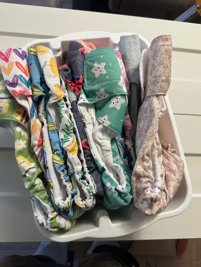 Doggy diapers. Some Disposable and 12 reusable. Good for medium sized dogs, it fit our 35lb bernadoo...