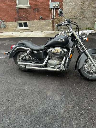 2000 Honda shadow 750cc ace 54,000km lowering kit installed. Needs a battery can be boosted to run c...