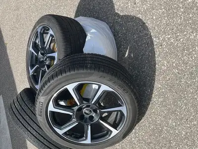 Selling set of four OEM all season wheels for Audi. Includes 19-inch alloy rims and Pirelli tires 25...