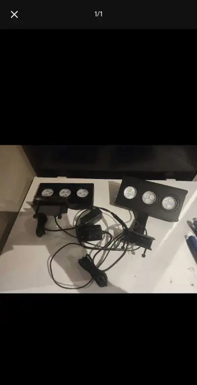 I'm selling a used aquarium light set, perfect for enhancing your aquarium's ecosystem with optimal...